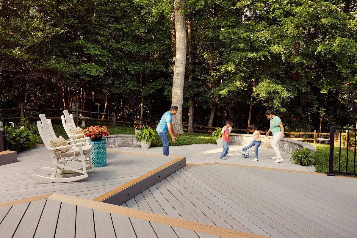 family playing near composite deck