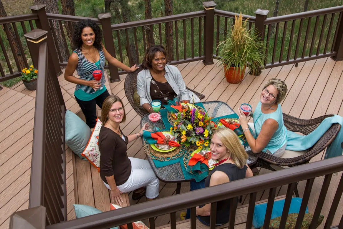 group of female relaxing on wooden deck