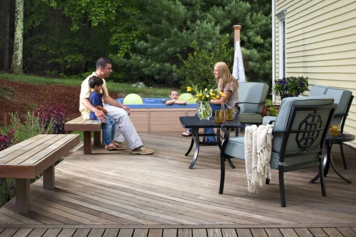 family sharing happy momments in backyard deck