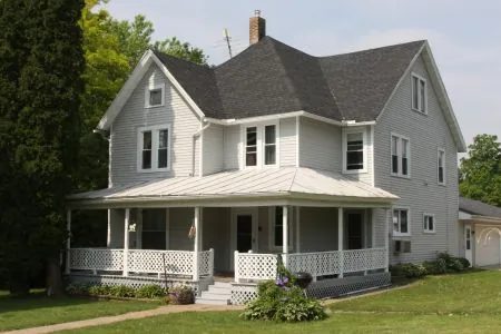 two story farmhouse with porch